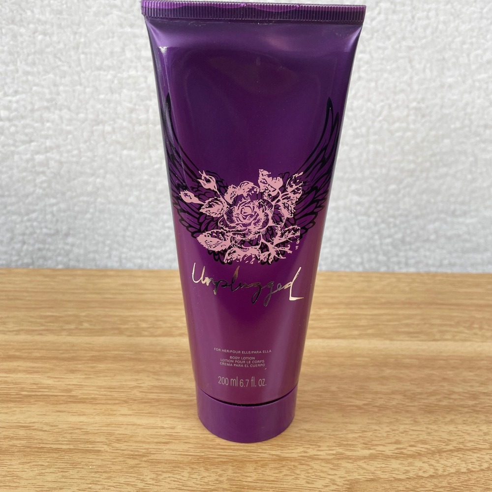 Avon Unplugged for Her Body Lotion 6.7 fl oz Purple Tube Rose Wing Graphic 200ml